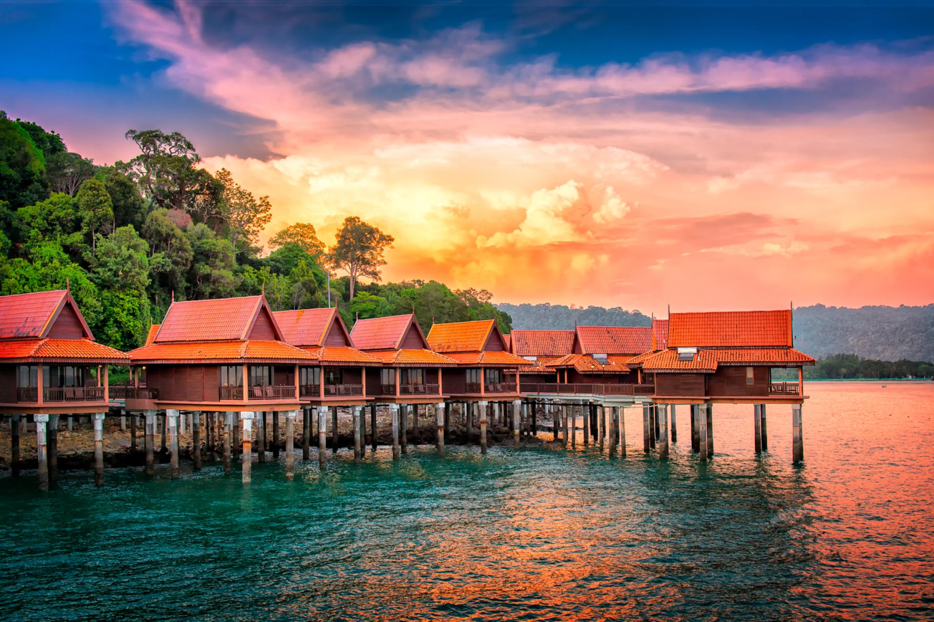 European Photography Awards Winner - Water chalets on Langkawy, Malaysia under dramatic sky
