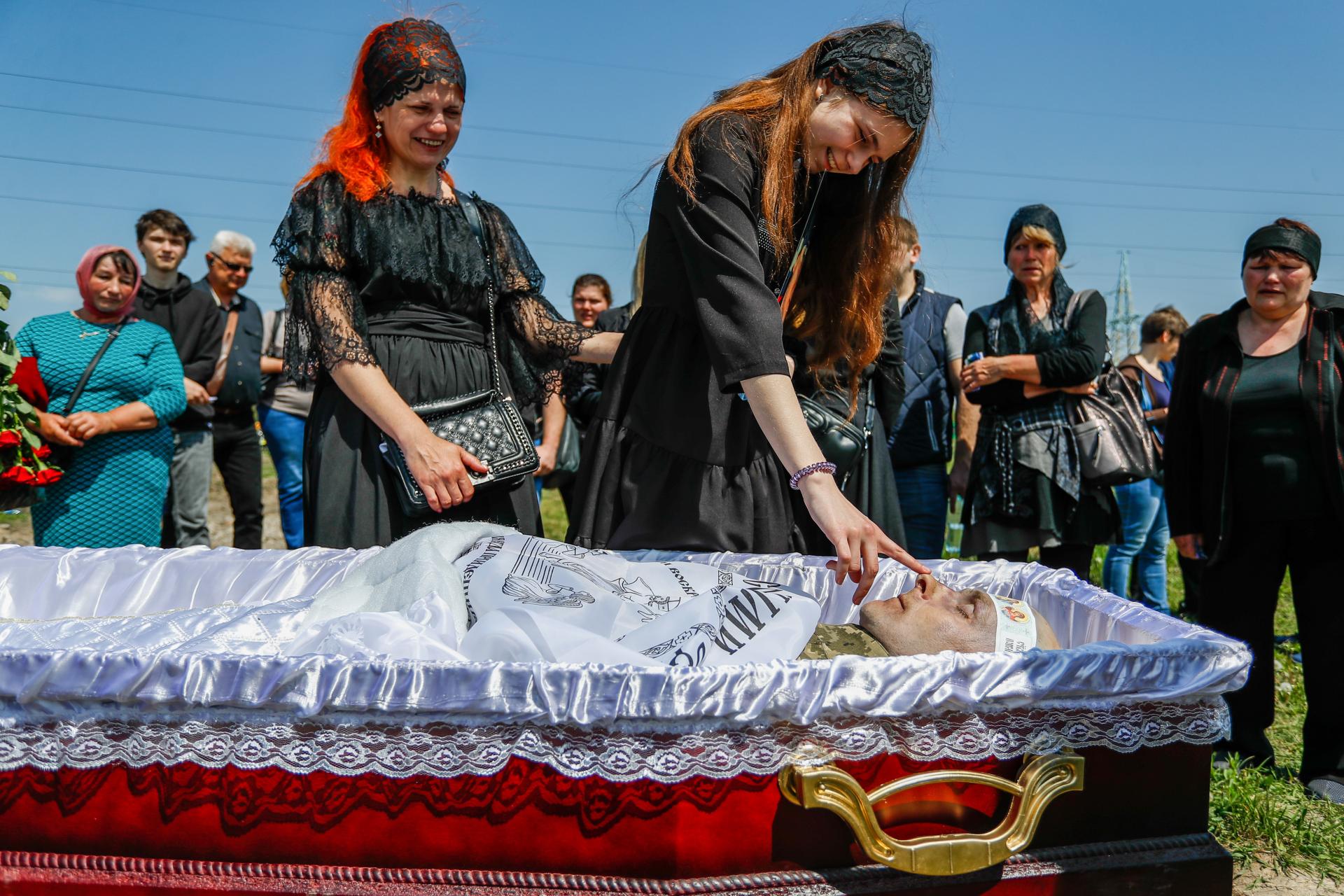 European Photography Awards Winner - The last smile for Ukrainian dad